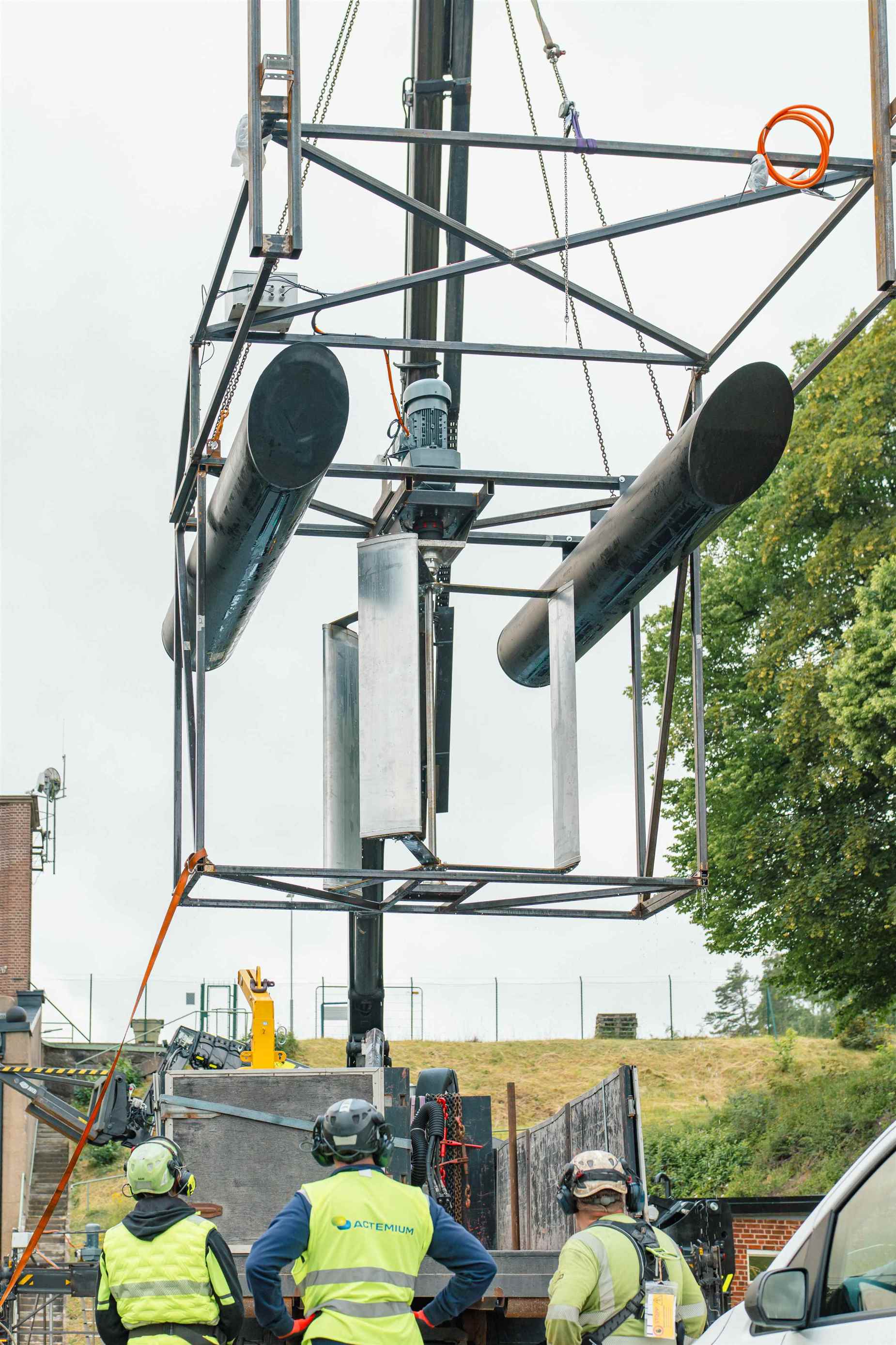 The turbine lifted into place at the test facility